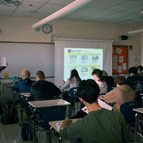 Classroom financial literacy presentation.