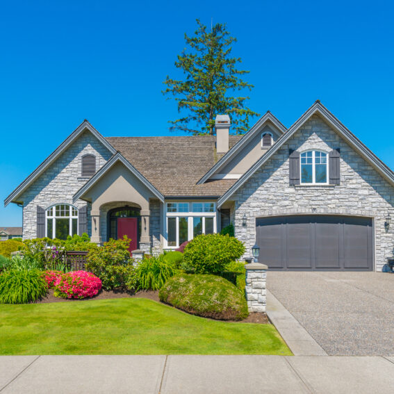 Picturesque home with blue sky in the background.